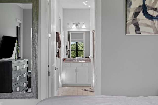 bathroom with vanity and tile patterned floors