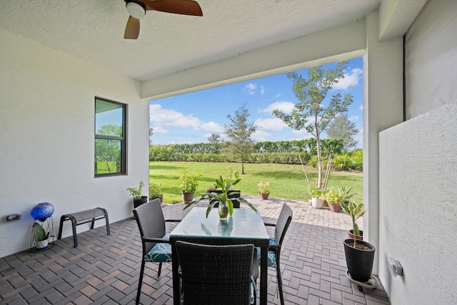 view of patio with ceiling fan