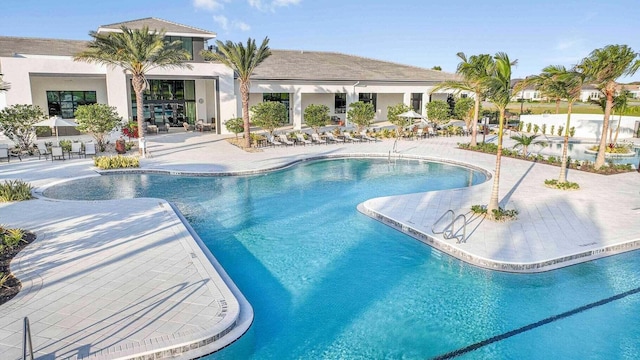 view of pool featuring a patio area