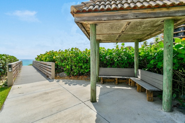 view of patio featuring a water view