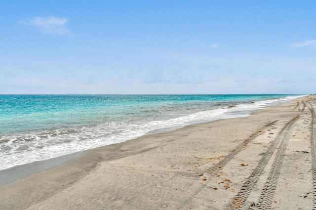 property view of water featuring a view of the beach