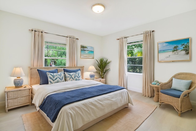 bedroom featuring multiple windows