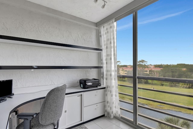 office with light tile patterned floors