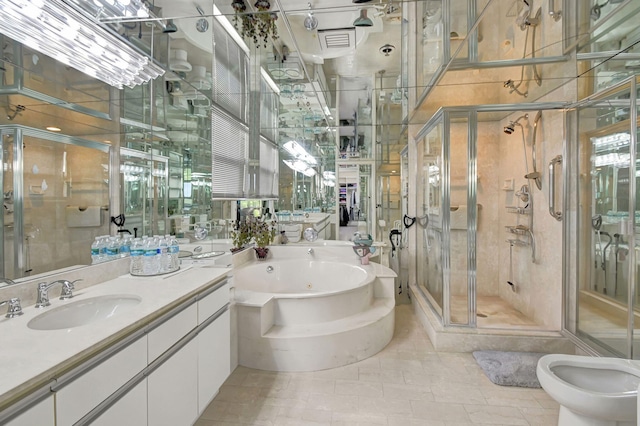 bathroom featuring shower with separate bathtub, a bidet, tile patterned floors, and vanity