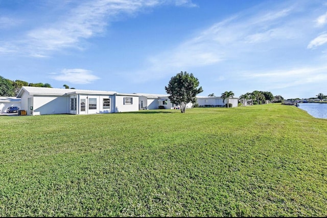 view of yard featuring a water view