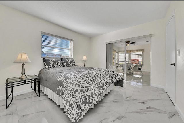bedroom with baseboards and marble finish floor