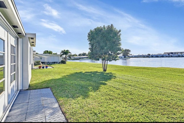view of yard with a water view
