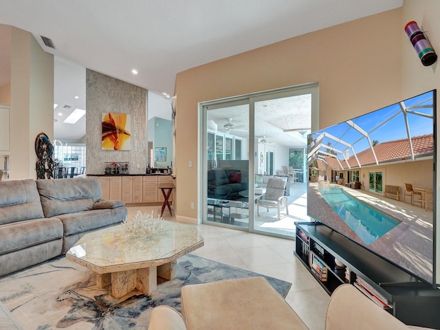 living room featuring plenty of natural light and light tile patterned floors