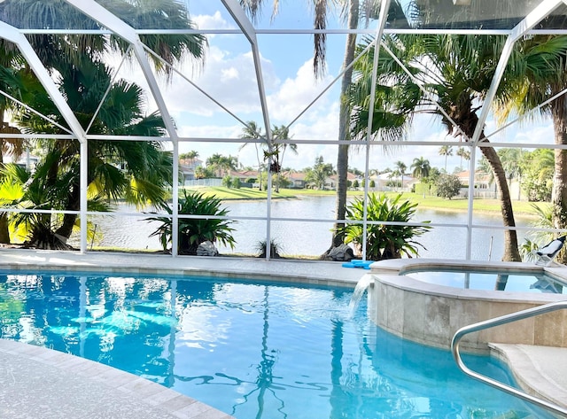 view of swimming pool with a water view, glass enclosure, a jacuzzi, and pool water feature