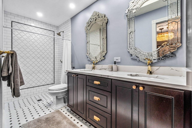 bathroom with vanity, toilet, a shower with curtain, and tile patterned flooring