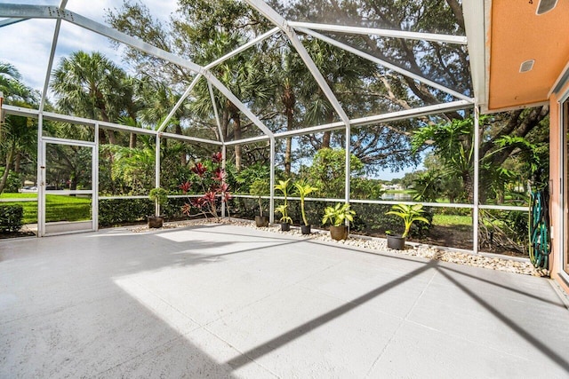 view of patio / terrace with a lanai