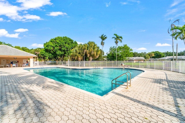 view of pool featuring a patio