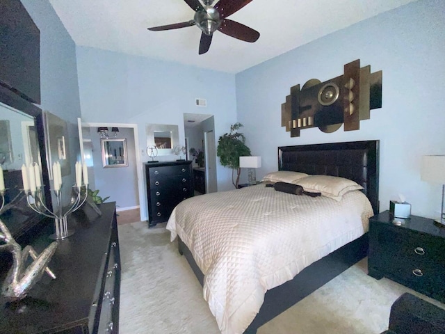 bedroom with light colored carpet and ceiling fan