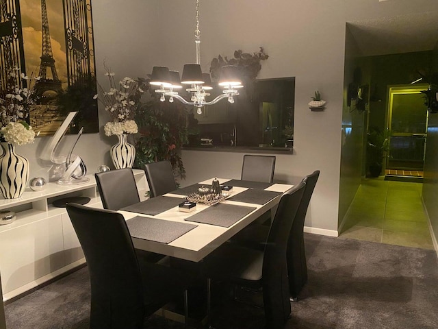 dining room featuring carpet flooring