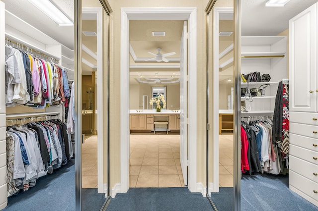 6189 Island Walk Unit A, Boca Raton, FL 33496 - spacious closet featuring ceiling fan, light colored carpet, and light tile patterned floors