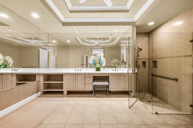 bathroom with vanity, crown molding, a tray ceiling, tile patterned flooring, and an enclosed shower