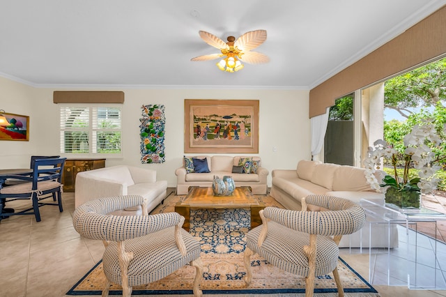 living room featuring ornamental molding, ceiling fan, and light tile patterned floors