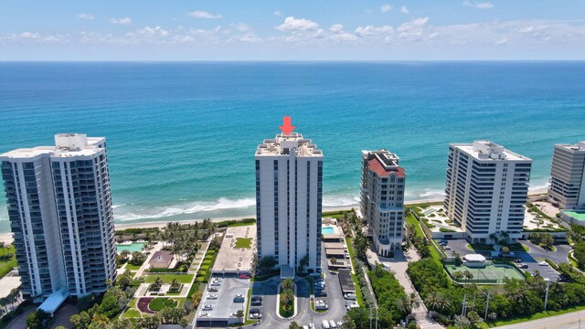 aerial view featuring a water view and a view of the beach