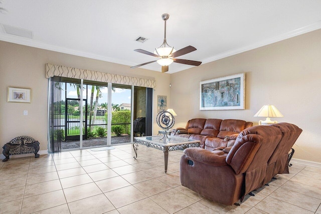 tiled living room featuring ceiling fan and crown molding