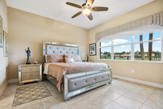 tiled bedroom with ceiling fan