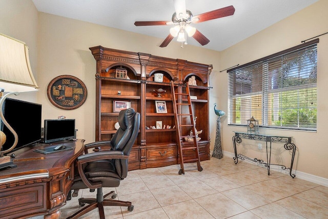 tiled office space with ceiling fan