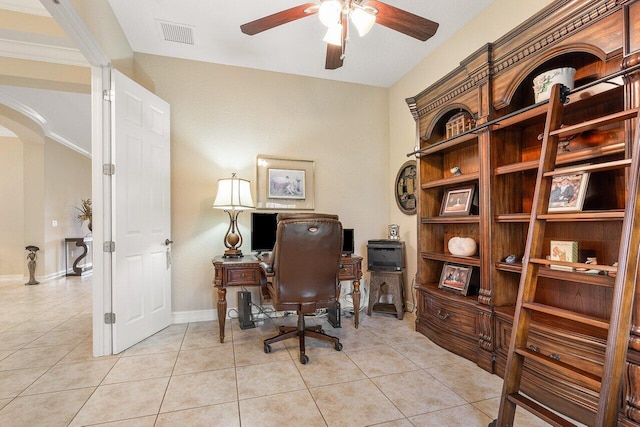 home office featuring ceiling fan, ornamental molding, and light tile patterned flooring