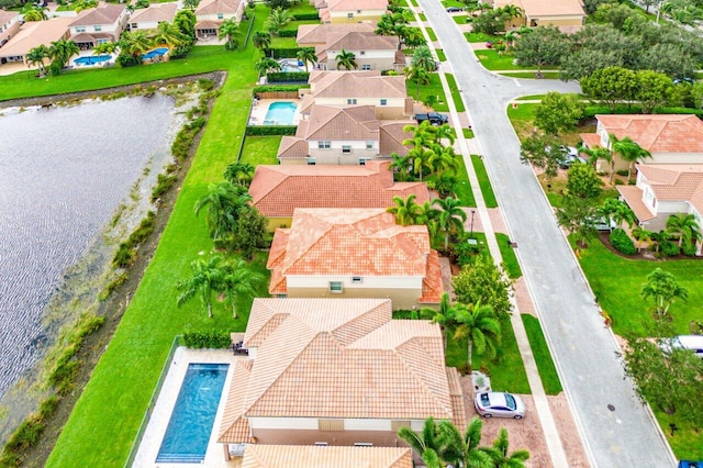 drone / aerial view featuring a water view