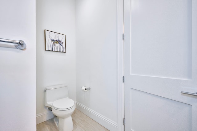 bathroom featuring toilet