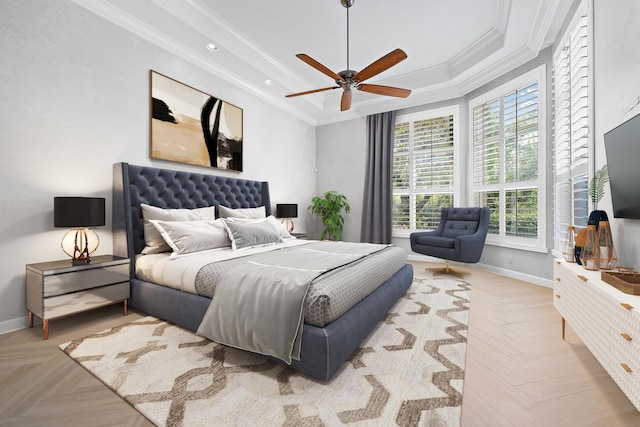 bedroom with crown molding, ceiling fan, and light parquet flooring