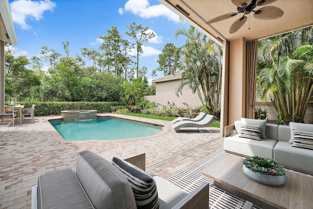 view of pool featuring a patio, an outdoor living space, and ceiling fan