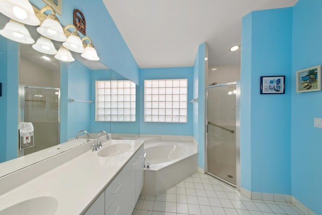 bathroom featuring vanity, tile patterned floors, lofted ceiling, and separate shower and tub