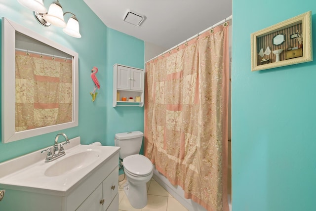 full bathroom with vanity, shower / bath combo, toilet, and tile patterned flooring