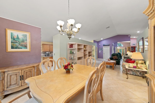 tiled dining area featuring a notable chandelier and vaulted ceiling