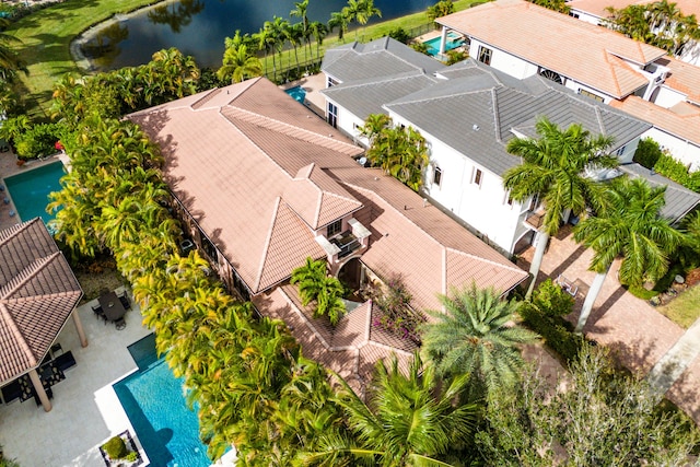 birds eye view of property featuring a water view