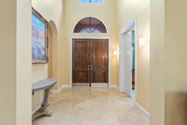 foyer with a high ceiling