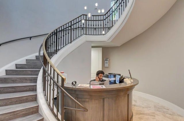 stairs with a towering ceiling