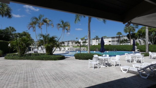 view of patio with a community pool