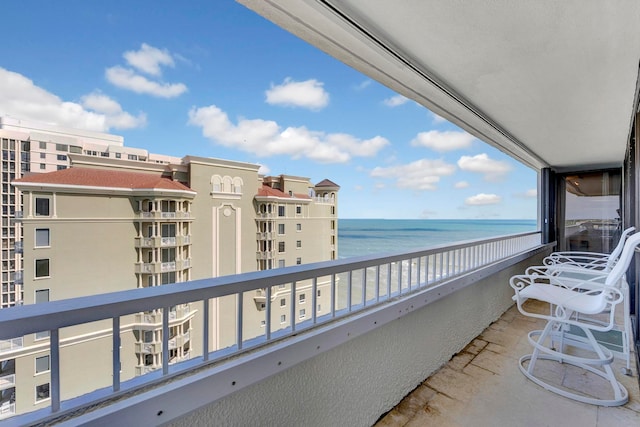 balcony featuring a water view