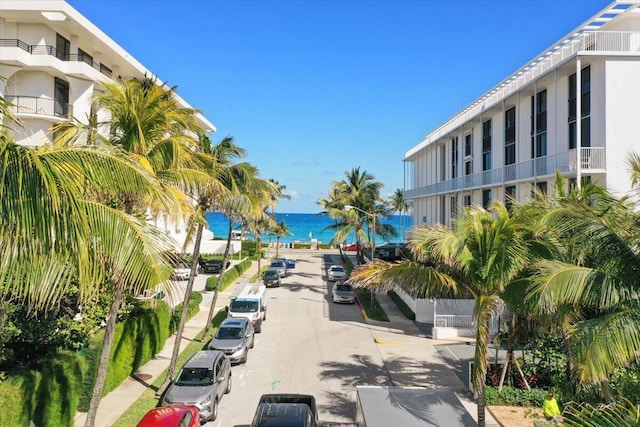 surrounding community featuring a water view