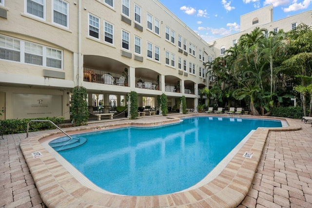 view of pool featuring a patio area