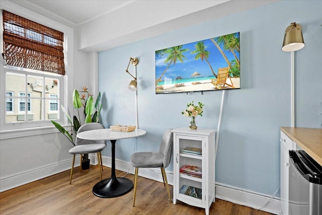 sitting room with hardwood / wood-style flooring