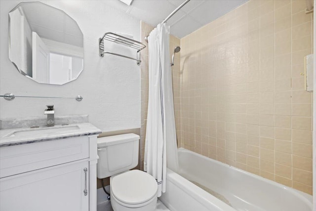 full bathroom featuring vanity, shower / bathtub combination with curtain, and toilet