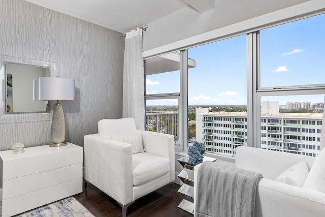 875 E Camino Real Unit 16H & G, Boca Raton, FL 33432 - sitting room with dark wood finished floors and a city view