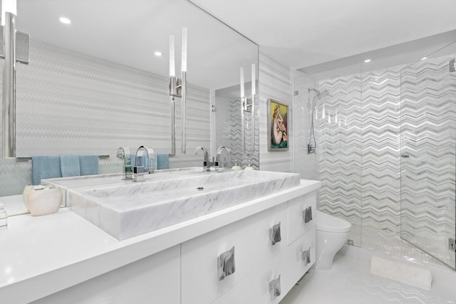 875 E Camino Real Unit 16H & G, Boca Raton, FL 33432 - full bath featuring vanity, toilet, a stall shower, recessed lighting, and tile walls