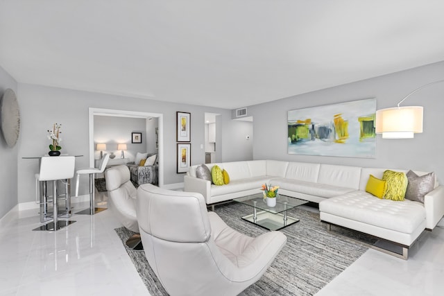 875 E Camino Real Unit 16H & G, Boca Raton, FL 33432 - living area featuring marble finish floors