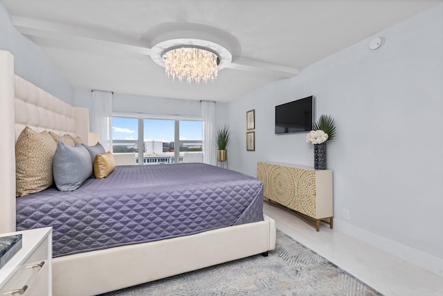 bedroom featuring a chandelier