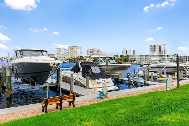 875 E Camino Real Unit 16H & G, Boca Raton, FL 33432 - dock with boat lift, a water view, and a view of city