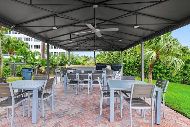 875 E Camino Real Unit 16H & G, Boca Raton, FL 33432 - view of patio with outdoor dining space, a gazebo, ceiling fan, and area for grilling