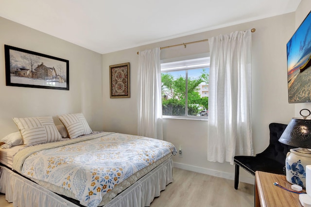 bedroom featuring light hardwood / wood-style floors