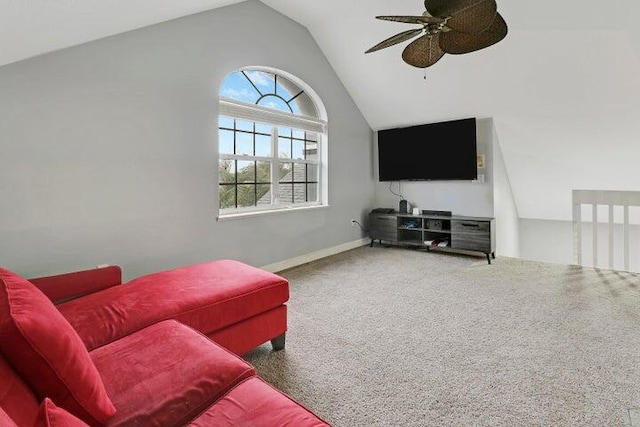 living room with ceiling fan, lofted ceiling, and carpet flooring